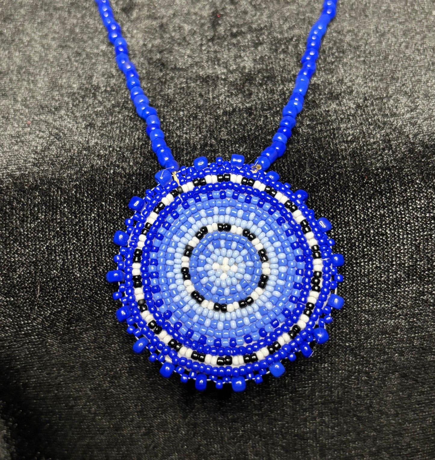 Okchamali Medallion